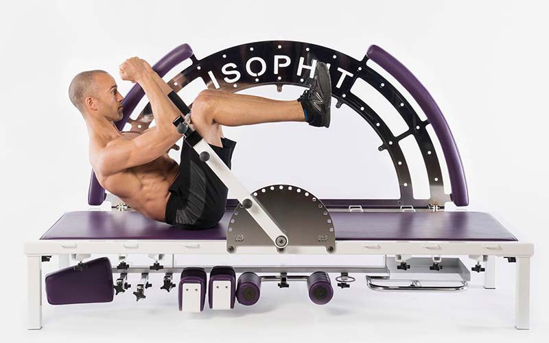 man working out on Isophit Strength Trainer